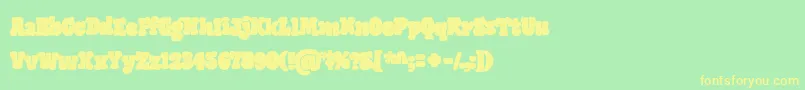 GiantHeadRegularOt Font – Yellow Fonts on Green Background