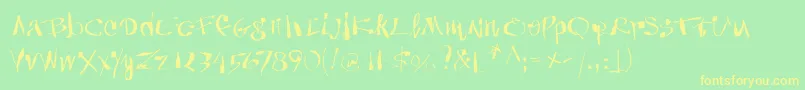 Anarchica Font – Yellow Fonts on Green Background