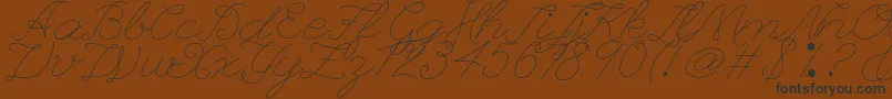 Leaguescriptnumberone-Schriftart – Schwarze Schriften auf braunem Hintergrund