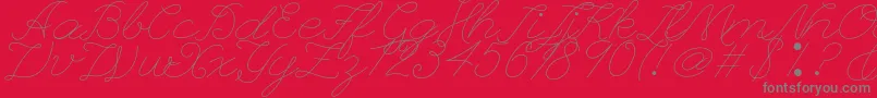 Leaguescriptnumberone Font – Gray Fonts on Red Background