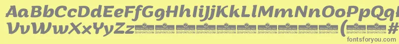 ArturoBolditalicTrial-fontti – harmaat kirjasimet keltaisella taustalla