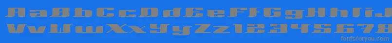 Xeranthemum-fontti – harmaat kirjasimet sinisellä taustalla