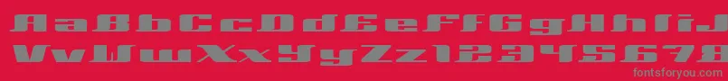 Xeranthemum-fontti – harmaat kirjasimet punaisella taustalla