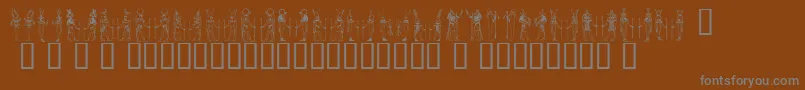 Deities ffy Font – Gray Fonts on Brown Background