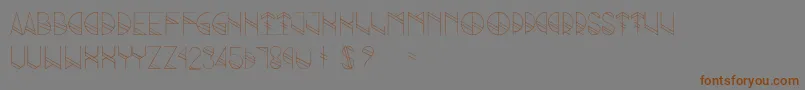 フォントGrind – 茶色の文字が灰色の背景にあります。