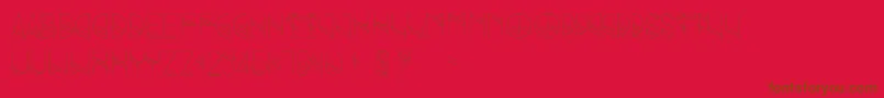 フォントGrind – 赤い背景に茶色の文字
