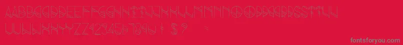 Grind-fontti – harmaat kirjasimet punaisella taustalla
