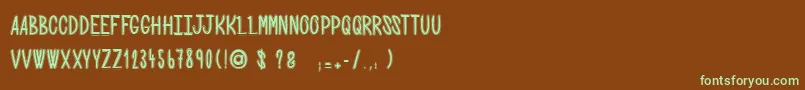 SpookyNight-fontti – vihreät fontit ruskealla taustalla
