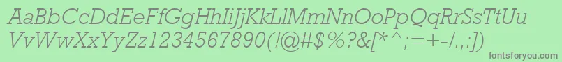RockwellMtLightItalic-fontti – harmaat kirjasimet vihreällä taustalla