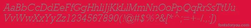 RockwellMtLightItalic-fontti – harmaat kirjasimet punaisella taustalla