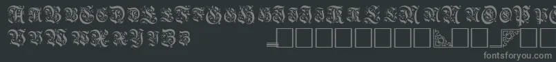TopiascapssskRegular-fontti – harmaat kirjasimet mustalla taustalla