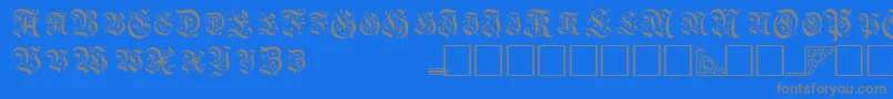 フォントTopiascapssskRegular – 青い背景に灰色の文字