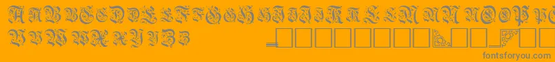 TopiascapssskRegular-Schriftart – Graue Schriften auf orangefarbenem Hintergrund