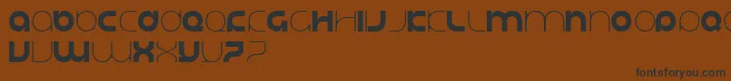 フォントJustifylazy – 黒い文字が茶色の背景にあります