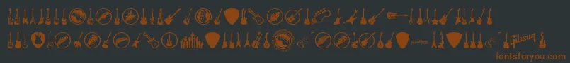 Fonte ElectricGuitarIcons – fontes marrons em um fundo preto