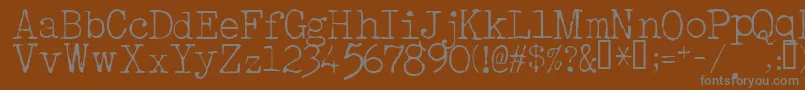 AcousticLight-fontti – harmaat kirjasimet ruskealla taustalla