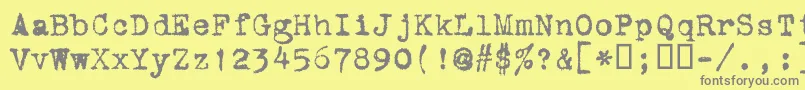 フォントVtcorona – 黄色の背景に灰色の文字