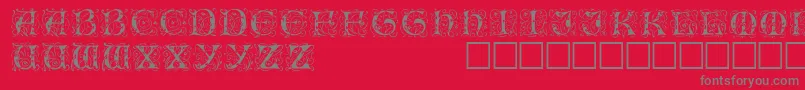 Fonte IlluminatitwodisplaycapssskRegular – fontes cinzas em um fundo vermelho