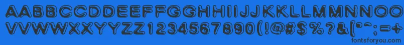 SkinnyZebra Font – Black Fonts on Blue Background