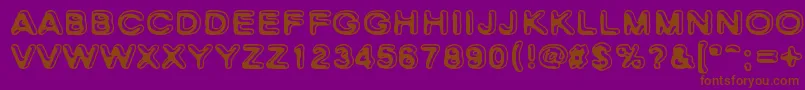 SkinnyZebra-Schriftart – Braune Schriften auf violettem Hintergrund