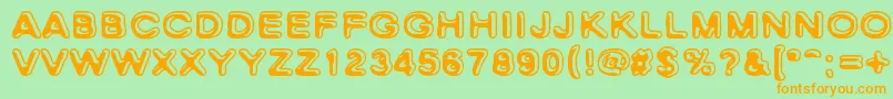 フォントSkinnyZebra – オレンジの文字が緑の背景にあります。