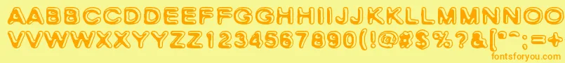 フォントSkinnyZebra – オレンジの文字が黄色の背景にあります。