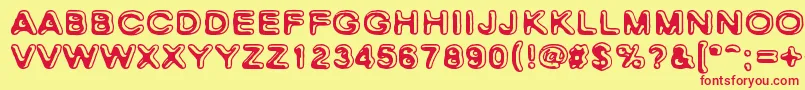 SkinnyZebra-Schriftart – Rote Schriften auf gelbem Hintergrund