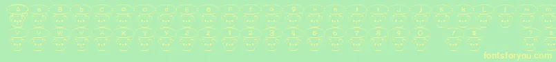 TKumaFont Font – Yellow Fonts on Green Background