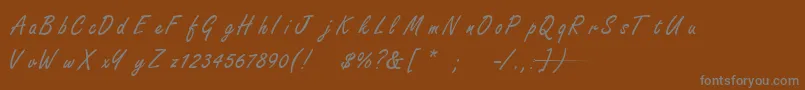 フォントFreestyleScriptNormal – 茶色の背景に灰色の文字