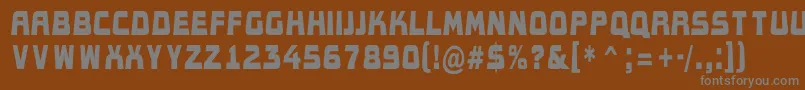 フォントAConceptotitulldbk – 茶色の背景に灰色の文字