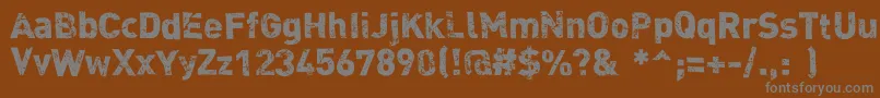 Dink Font – Gray Fonts on Brown Background