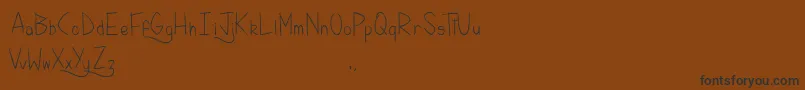 Шрифт KellyBrush – чёрные шрифты на коричневом фоне