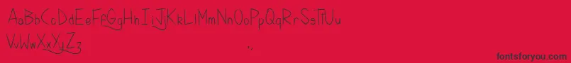 KellyBrush-Schriftart – Schwarze Schriften auf rotem Hintergrund