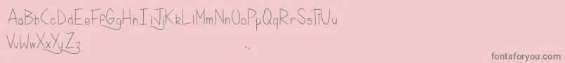 KellyBrush-Schriftart – Graue Schriften auf rosa Hintergrund