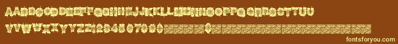 Winterdecor-fontti – keltaiset fontit ruskealla taustalla