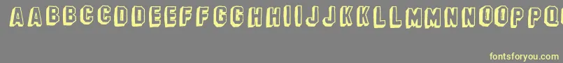 BanhartVer08Erc2008 Font – Yellow Fonts on Gray Background