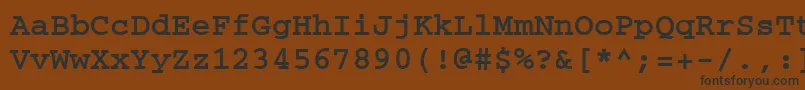 フォントCrtmB – 黒い文字が茶色の背景にあります