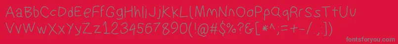 Suplexdriverregular Font – Gray Fonts on Red Background