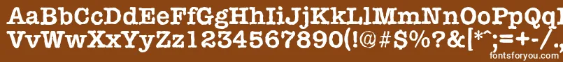 TypewriterantiqueBold-fontti – valkoiset fontit ruskealla taustalla