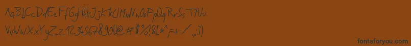 Шрифт JakobsHandwritingTtf – чёрные шрифты на коричневом фоне