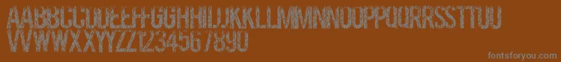 Grassevent Font – Gray Fonts on Brown Background