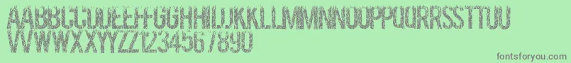 Grassevent Font – Gray Fonts on Green Background