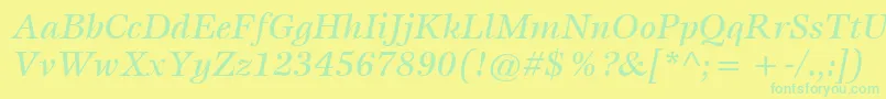 フォントItcEspritLtMediumItalic – 黄色い背景に緑の文字