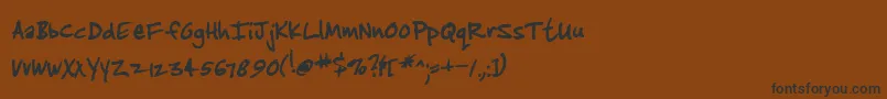 Jenkt-Schriftart – Schwarze Schriften auf braunem Hintergrund