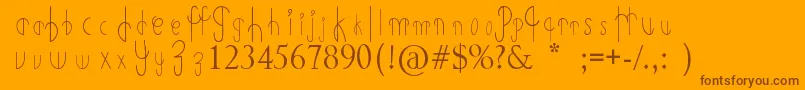 PrimitiveAlien Font – Brown Fonts on Orange Background