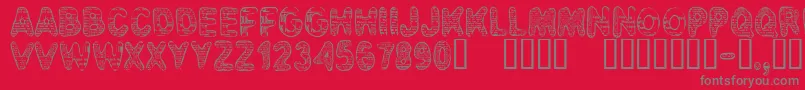CfbadnewsRegular Font – Gray Fonts on Red Background