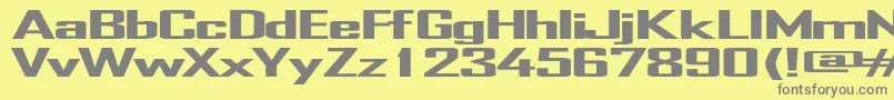 TrHeavy-fontti – harmaat kirjasimet keltaisella taustalla