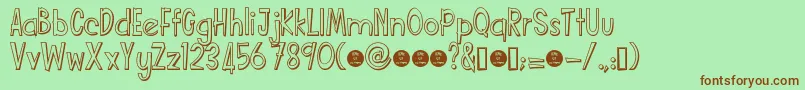 Funcartoonshadowdemo-fontti – ruskeat fontit vihreällä taustalla