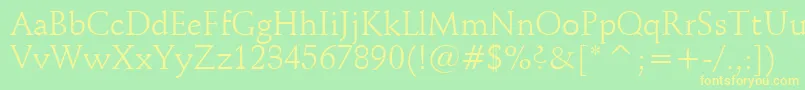 SchneidlerBt Font – Yellow Fonts on Green Background