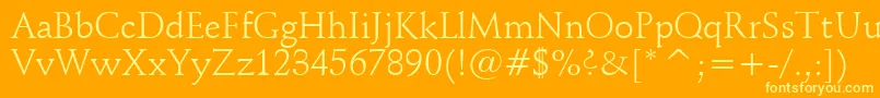 SchneidlerBt Font – Yellow Fonts on Orange Background